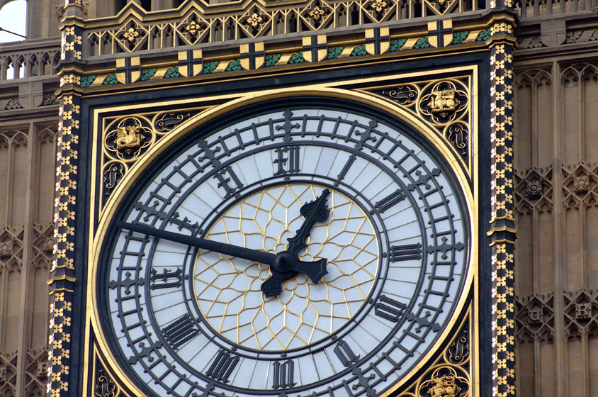 A close up of the Big Ben clock face on the top of a tower in the Houses of Parliament.  London, U.K..